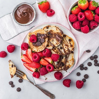 Mini pancake con gocce di cioccolato Mini pancake con gocce di cioccolato